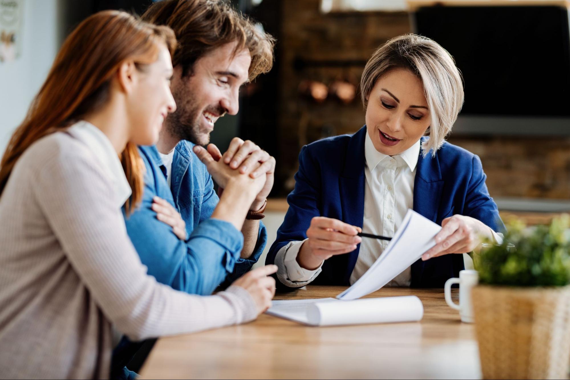 Mortgage adviser meeting with Kiwi couple about home loan